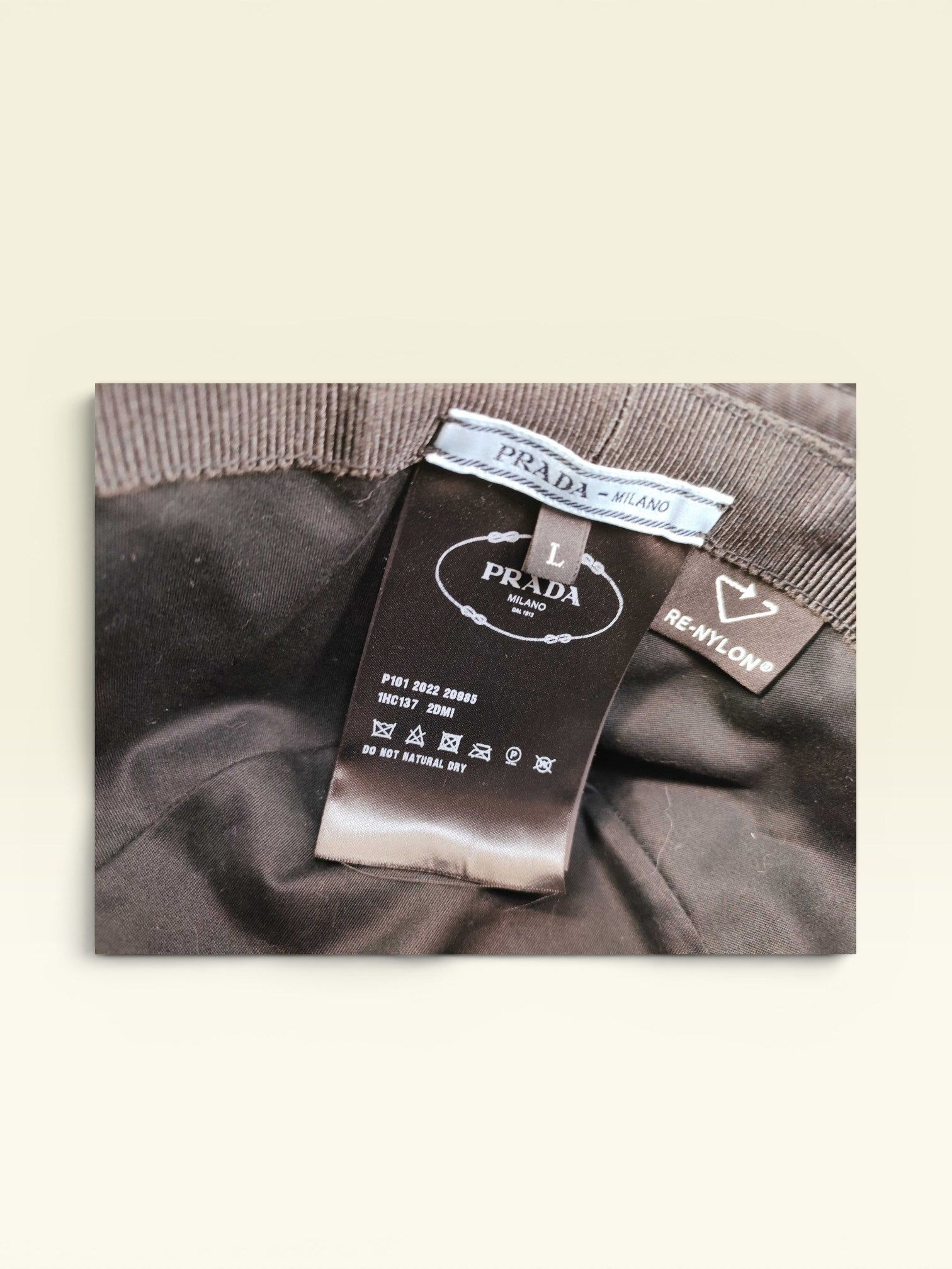PRADA Nylon Triangle Logo Bucket Hat