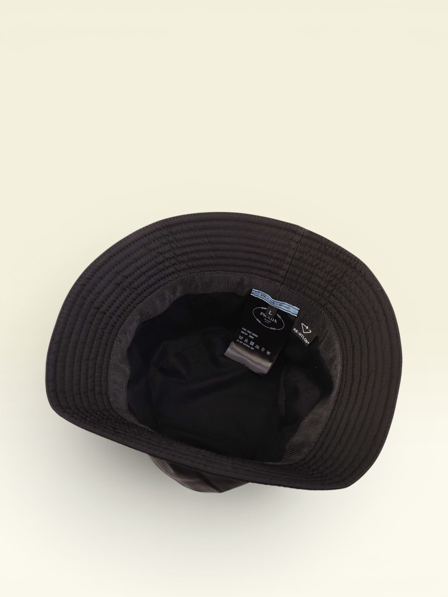 PRADA Nylon Triangle Logo Bucket Hat