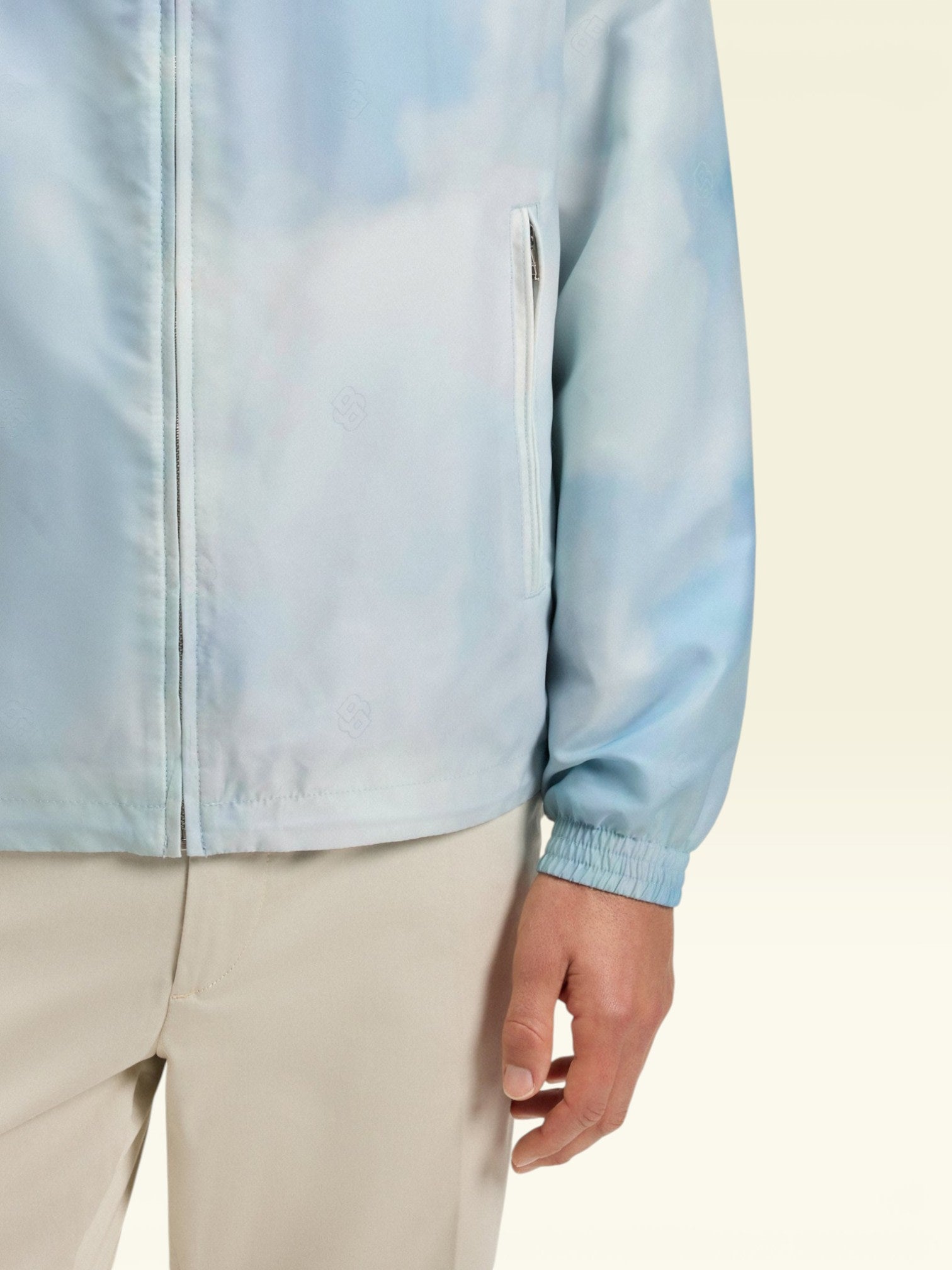 Water-repellent jacket with cloud artwork