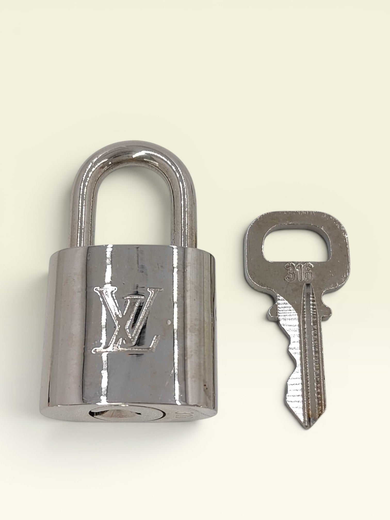 Louis Vuitton Silver Cadena & Keys